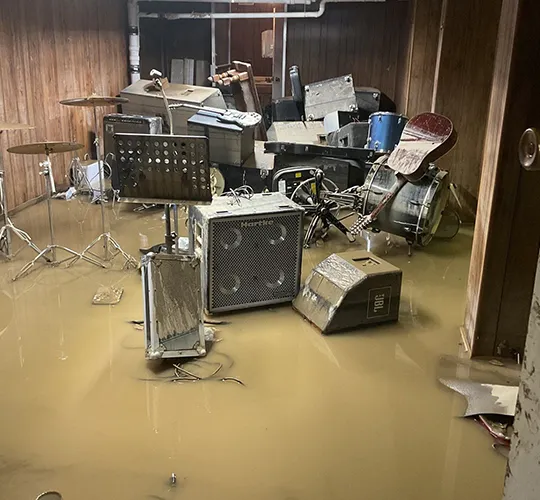 Emergency flood cleanup and structural drying are in progress.